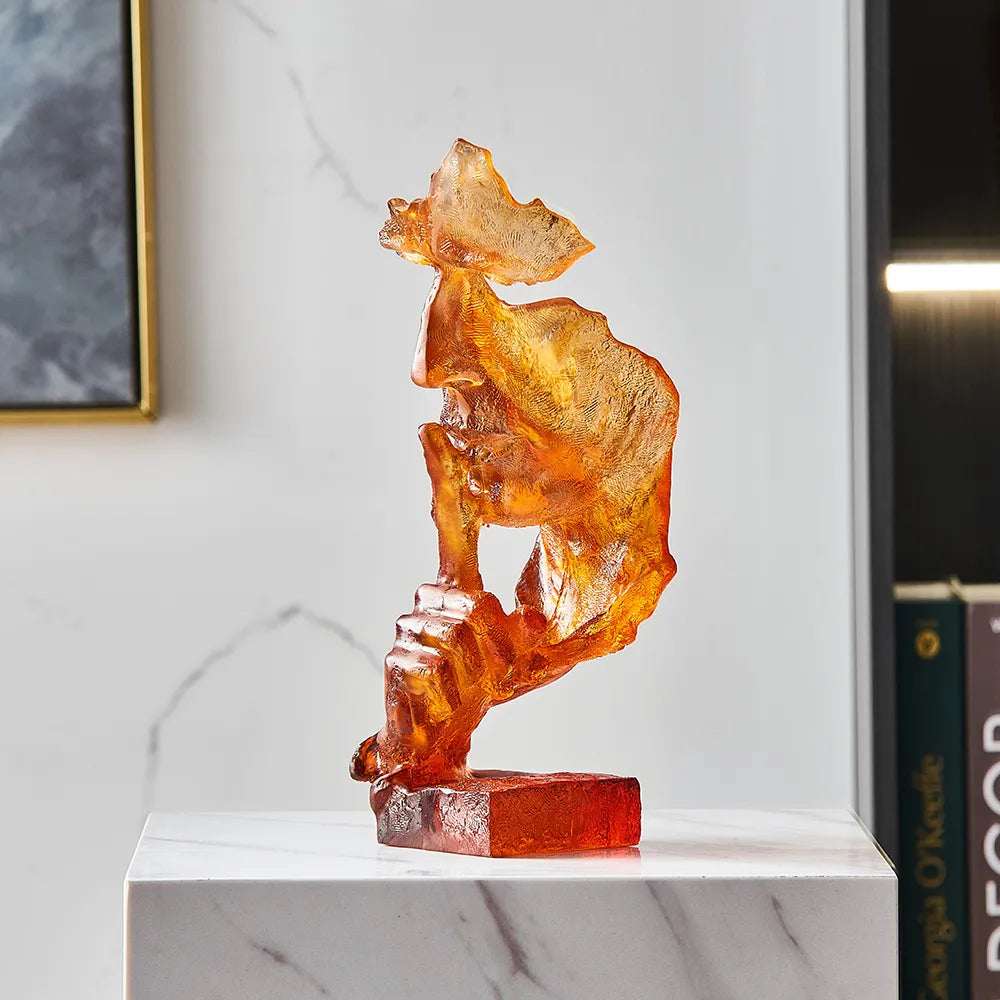 Silent Mask sculpture displayed in a contemporary living room setting, highlighting its artistic decor appeal.