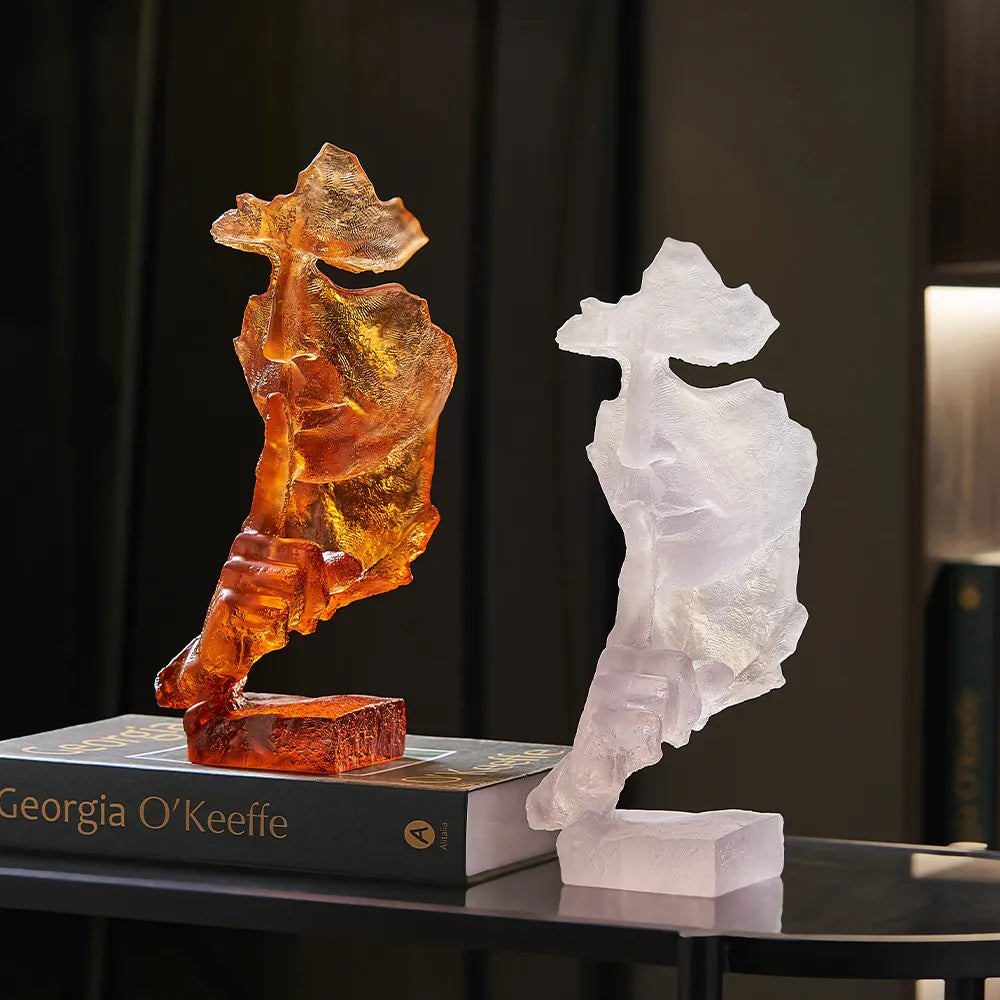 Silent Mask sculpture displayed in a contemporary living room setting, highlighting its artistic decor appeal.