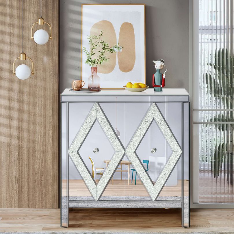 Side view of the stylish silver storage cabinet showcasing the mirror trim