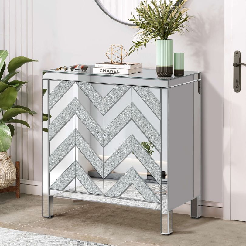 Elegant silver and grey entryway cabinet showcasing mirror trim and M shape design from the front.