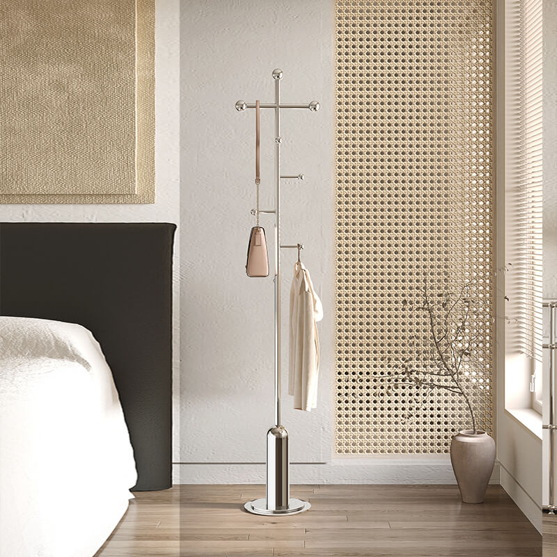Sleek stainless steel coat rack with 8 hooks in a modern entryway