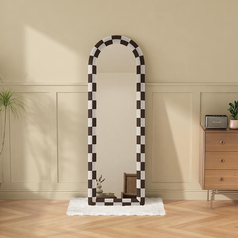 Front view of the sleek black and white floor mirror showcasing its minimalist design.