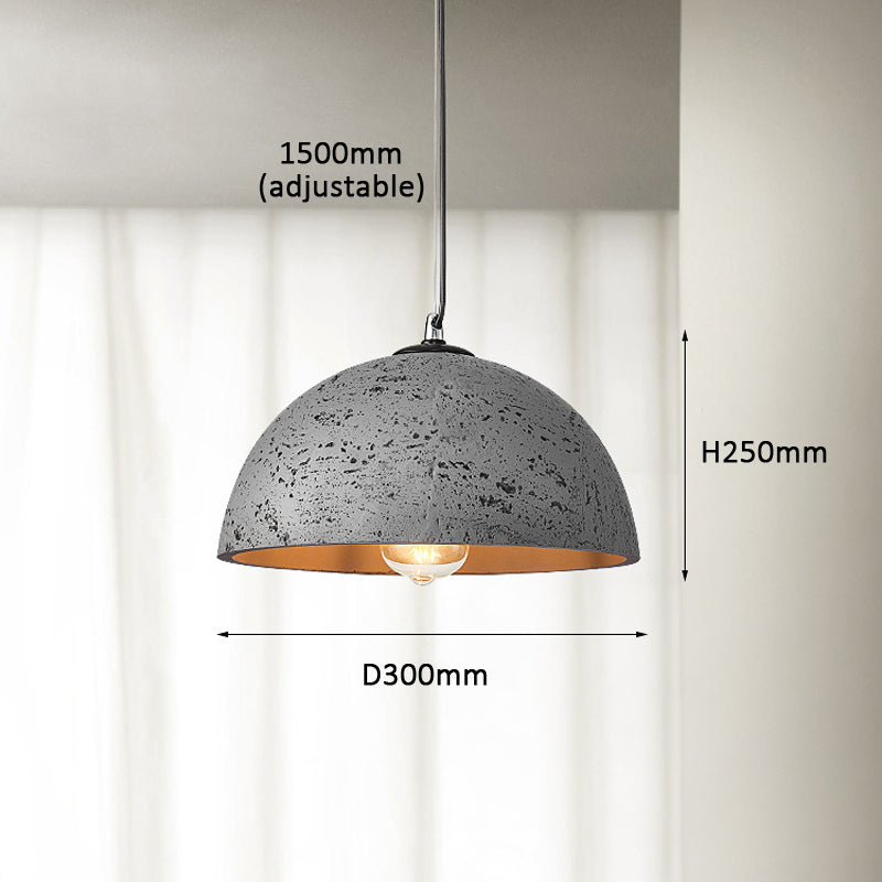 Modern pendant lamp illuminating a cozy dining area in a restaurant.