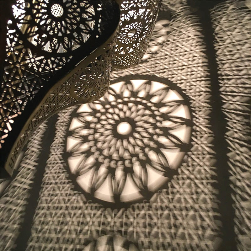 Close-up of the Moroccan pendant light highlighting its unique floral pattern.