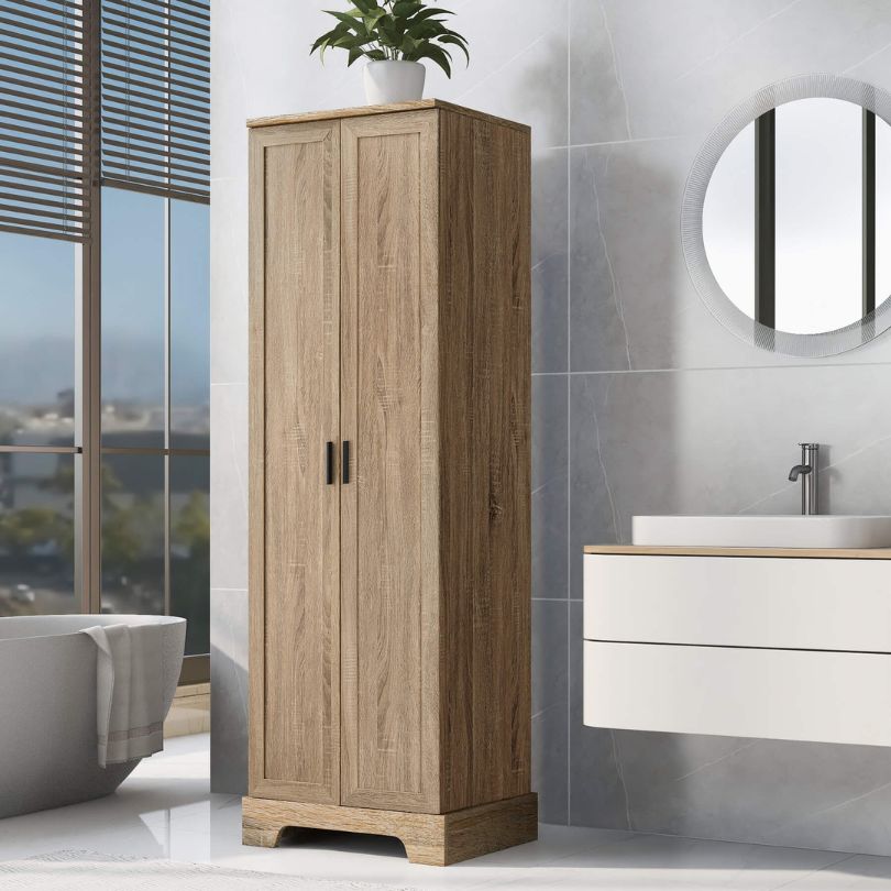 Elegant tall bathroom cabinet showcasing adjustable shelves and two doors from a side angle.