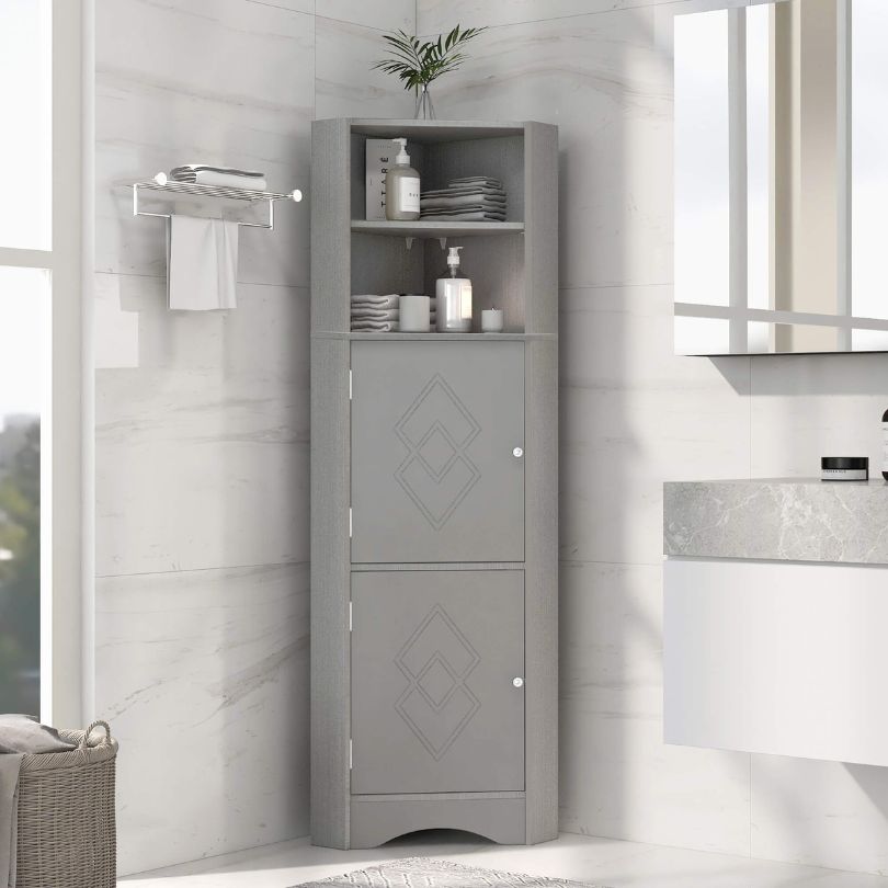Modern gray freestanding corner storage cabinet with two doors, showcasing its sleek design and functionality.