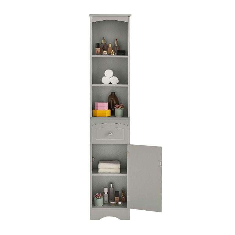 Front view of the tall grey cabinet with drawer, styled in a contemporary living room setting.