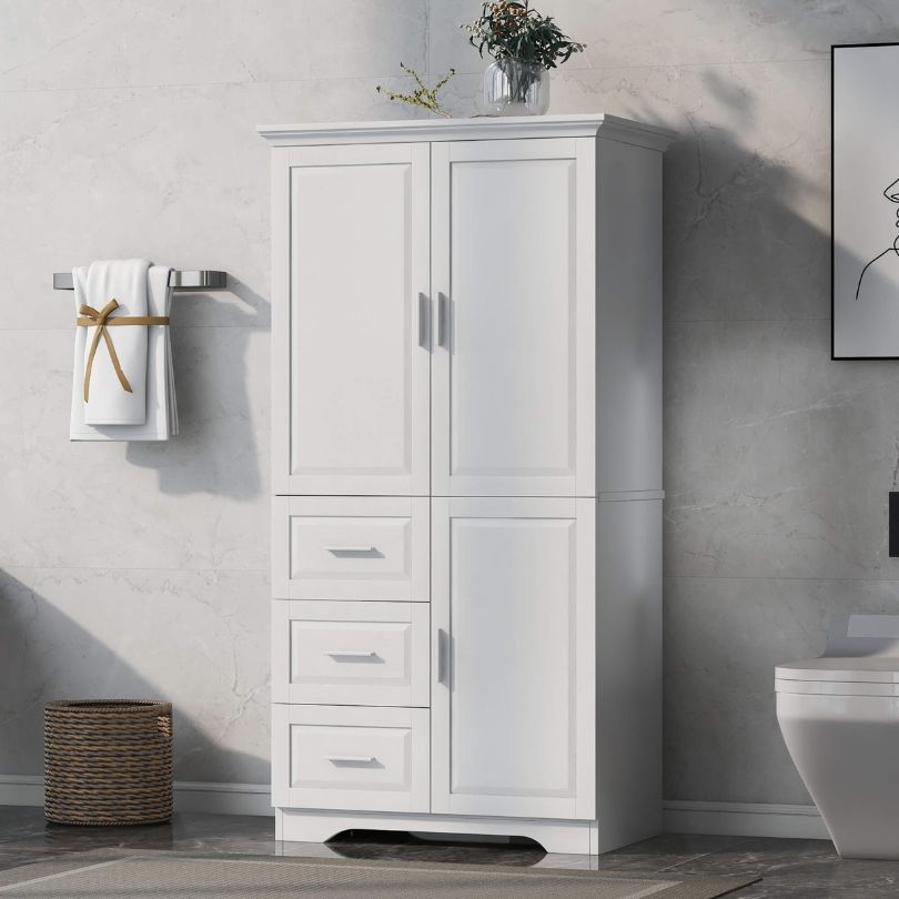 Tall white storage cabinet with adjustable shelves and drawers, showcasing its elegant design.