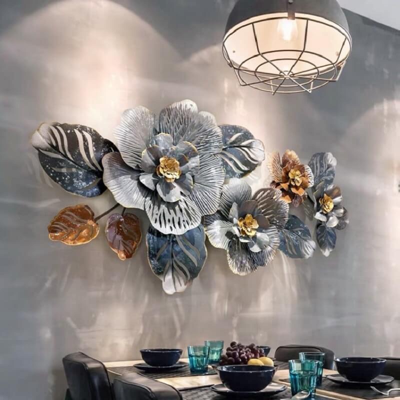 Close-up of decorative wall hanging featuring floral design against a neutral background.