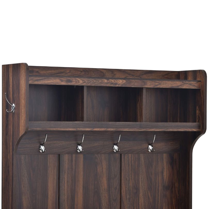 Elegant entryway hall tree with storage bench and hooks from the front angle.