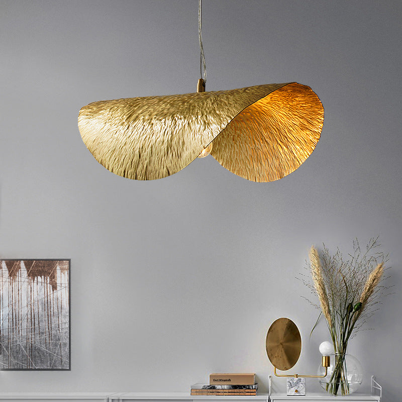 Stylish copper light hanging in a cozy living room, adding warmth and elegance to the decor.