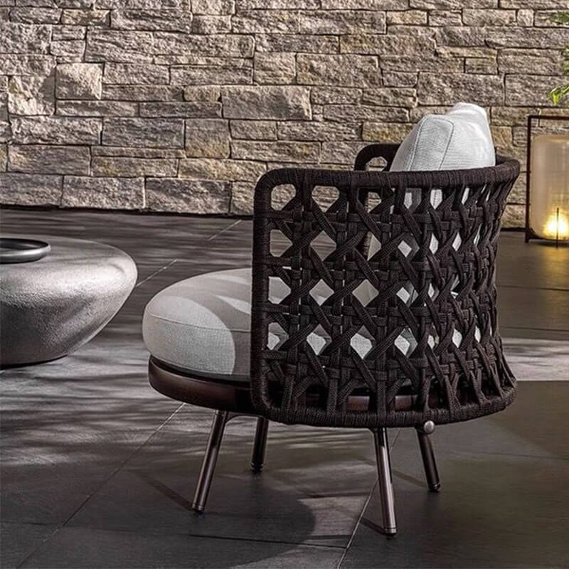 Serenity Teak Outdoor Conversational Set in a beautifully styled patio setting.
