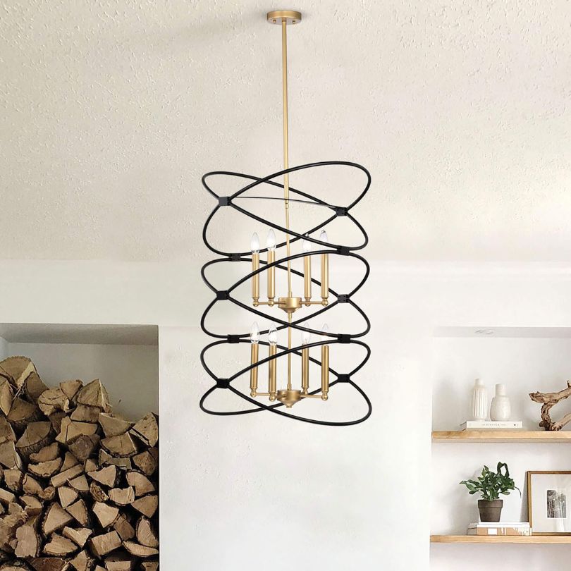 Detail shot of candle-like bulb holders on both tiers, illustrating the chandelier’s transitional style.