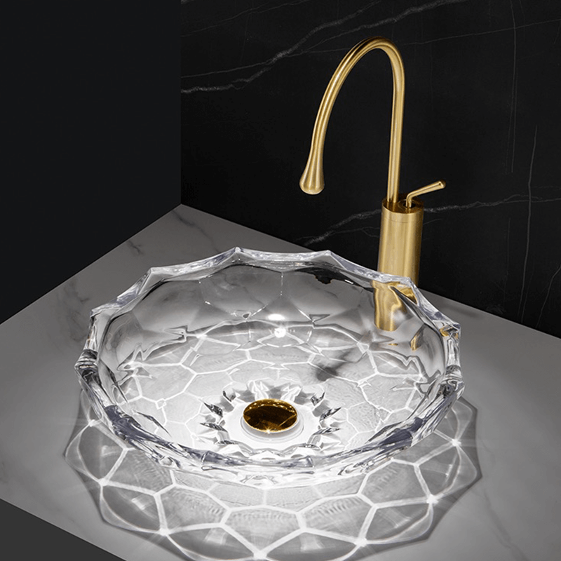 Side profile of the vessel sink installed in a luxury bathroom setting with polished chrome fixtures