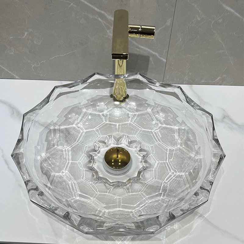 Top angle of the crystal lotus shaped tempered glass sink showcasing the faceted rim and transparency