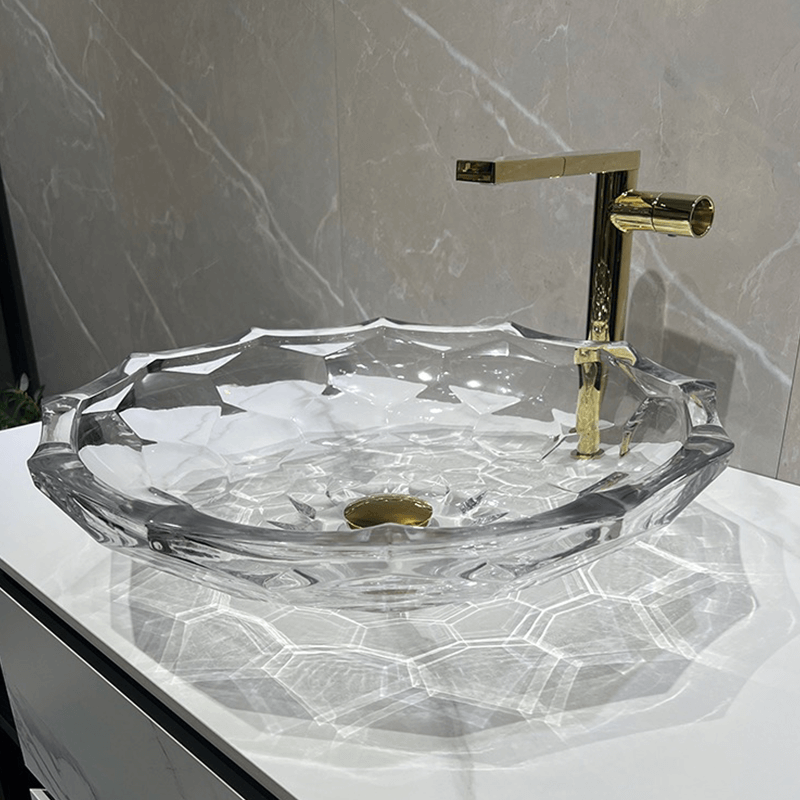 Side profile of the vessel sink installed in a luxury bathroom setting with polished chrome fixtures