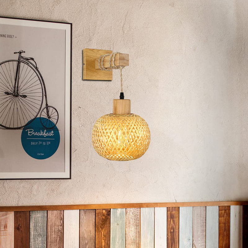 Close-up of rattan wall sconce showing handcrafted bamboo texture