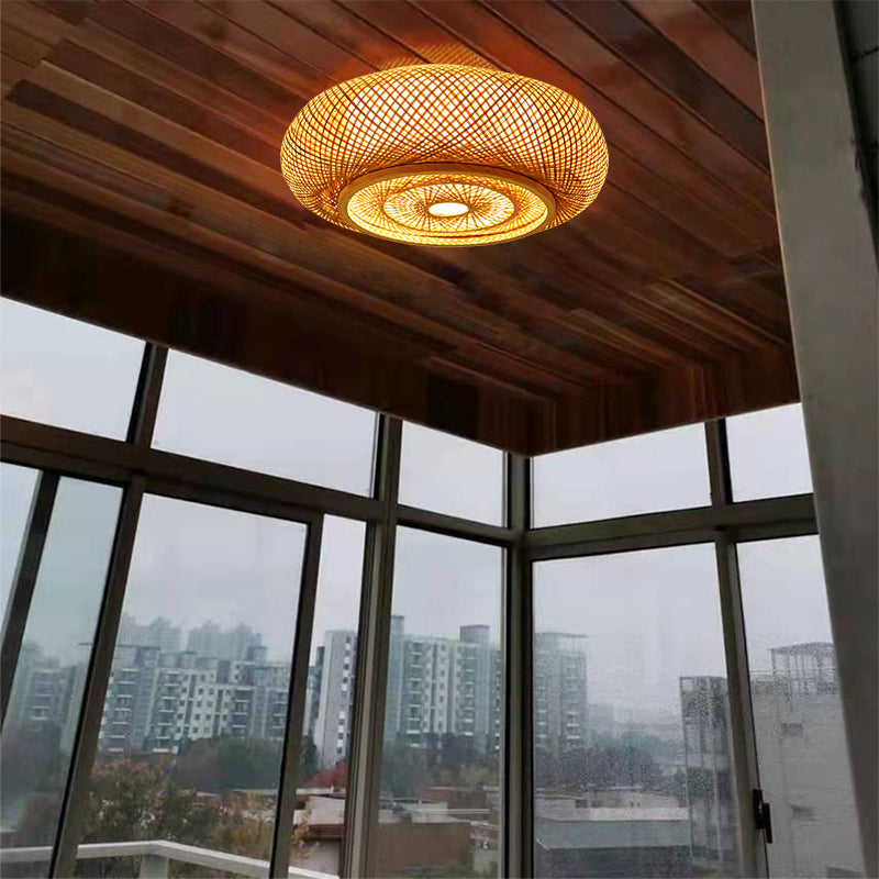 Close-up of the intricate bamboo weaving on the light fixture.