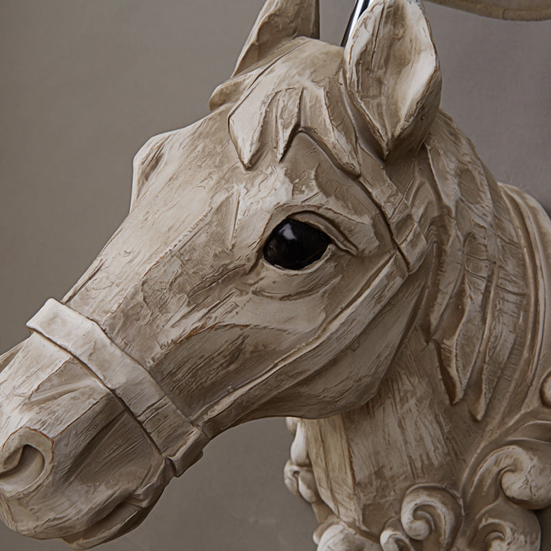 Industrial style Rustic Horse Resin Wall Lamp placed above a stylish dining area, enhancing the decor.
