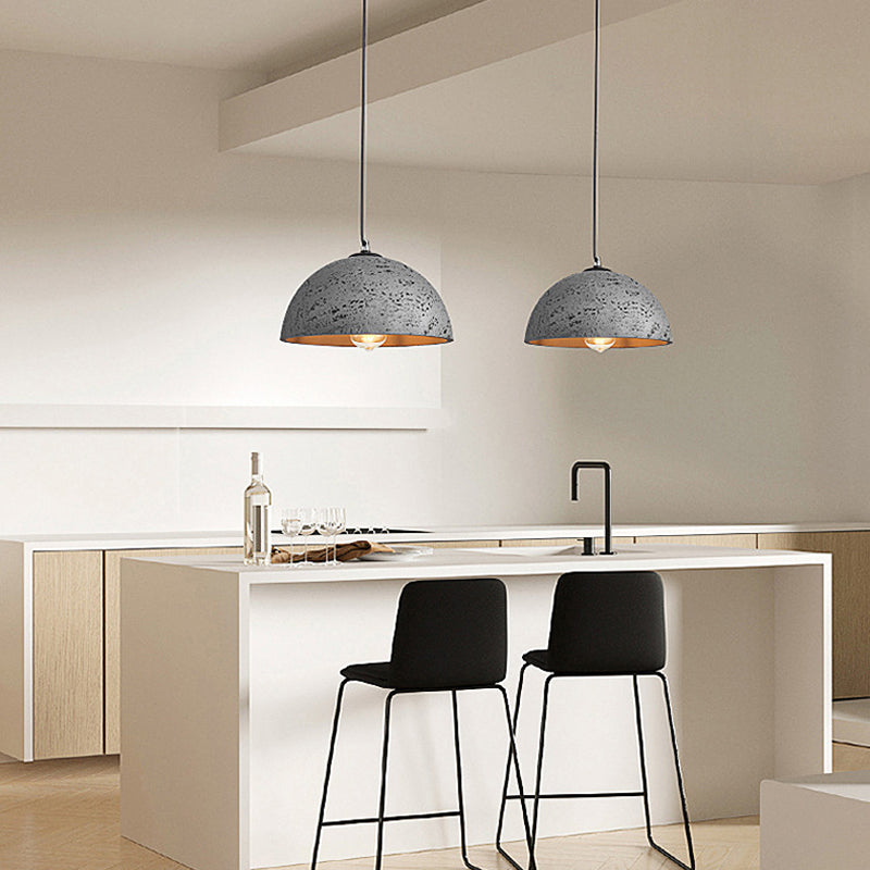 Elegant dome LED pendant light showcasing its stylish design from a side angle.