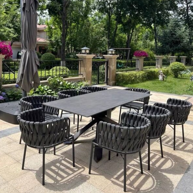 Marina Oval Outdoor Dining Set showcasing the elegant design and plush seating.
