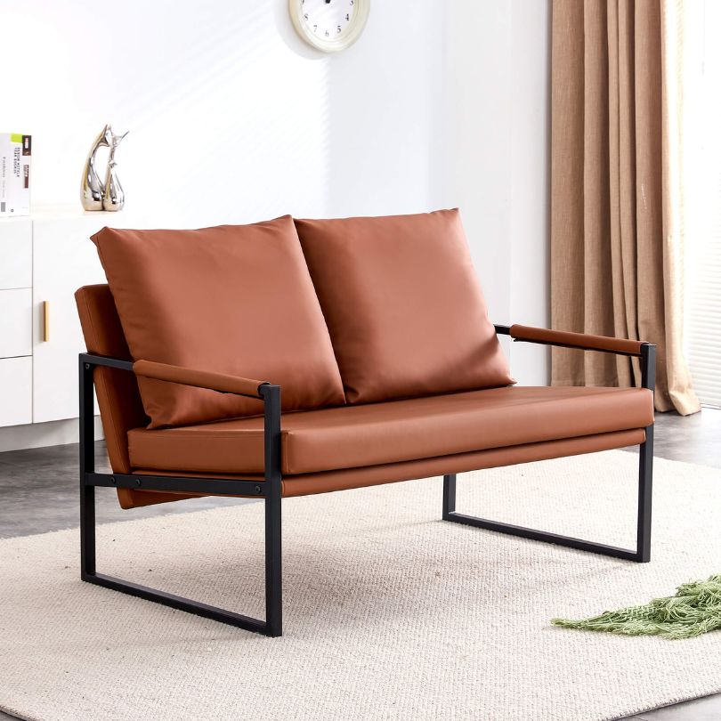 Front view of the chic brown PU leather sofa with pillows, showcasing its modern design.