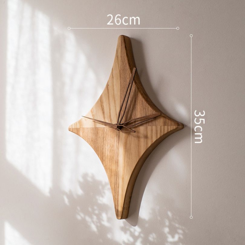 Side angle of the wooden star wall clock, highlighting the textured finish.