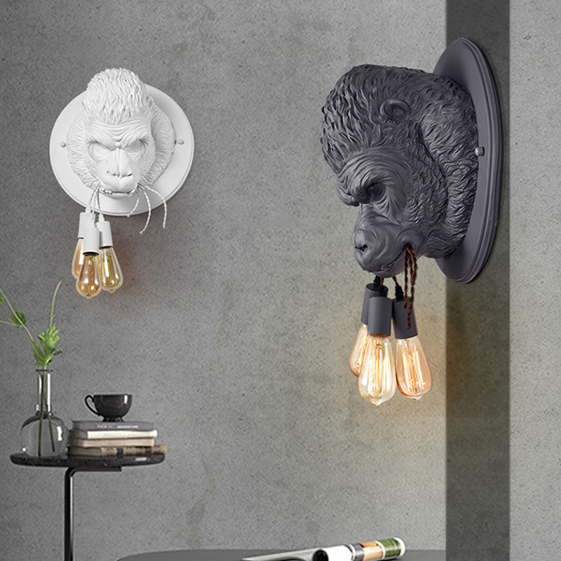 Nordic Gorilla Wall Sconce illuminated at night, creating a warm ambiance.