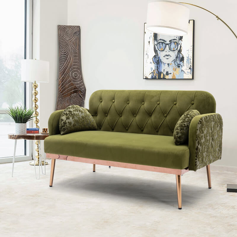 Chic velvet loveseat accent sofa with pillows in stylish living room setting.