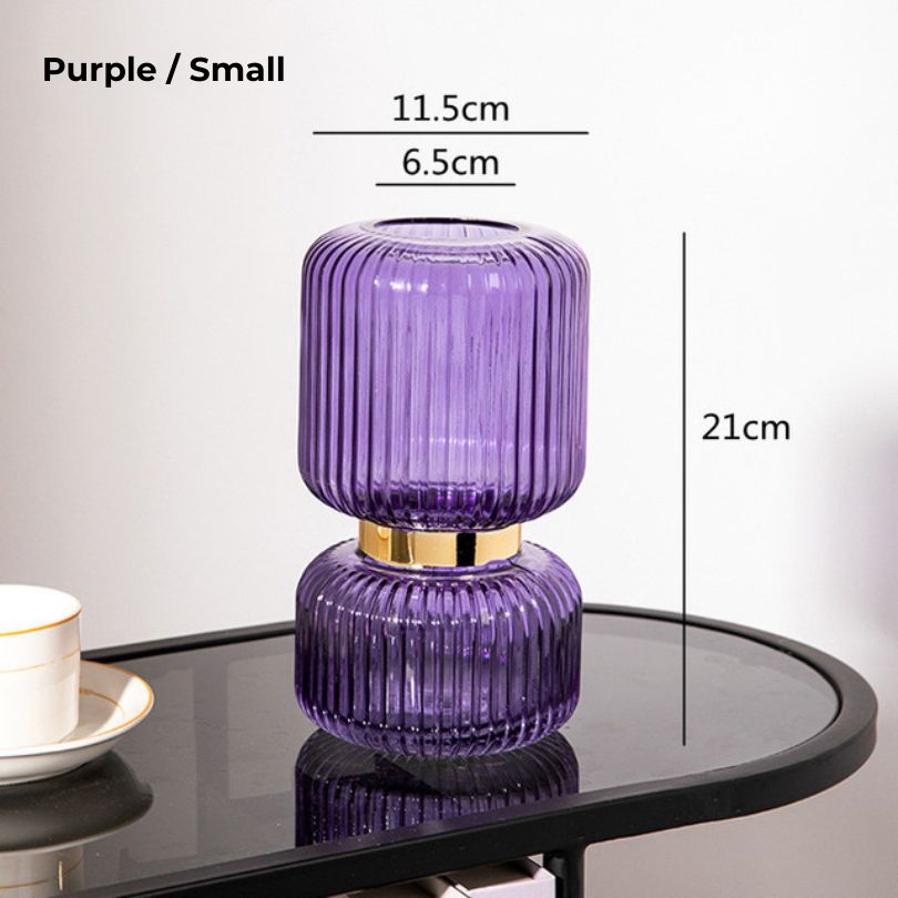 Large decorative flower vase set in a modern living room environment.