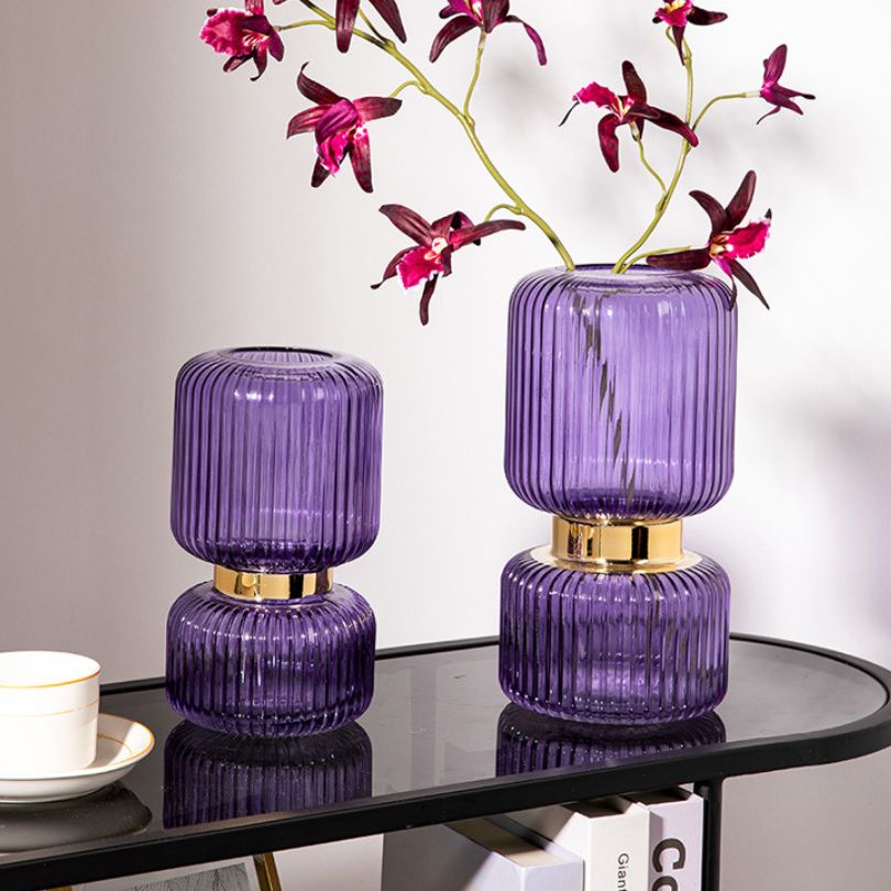 Large decorative flower vase set in a modern living room environment.
