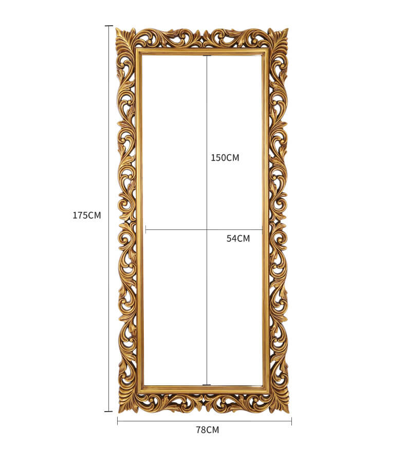 Elegant Victorian full-length vanity mirror displaying its antique gold frame in a stylish bedroom setting.