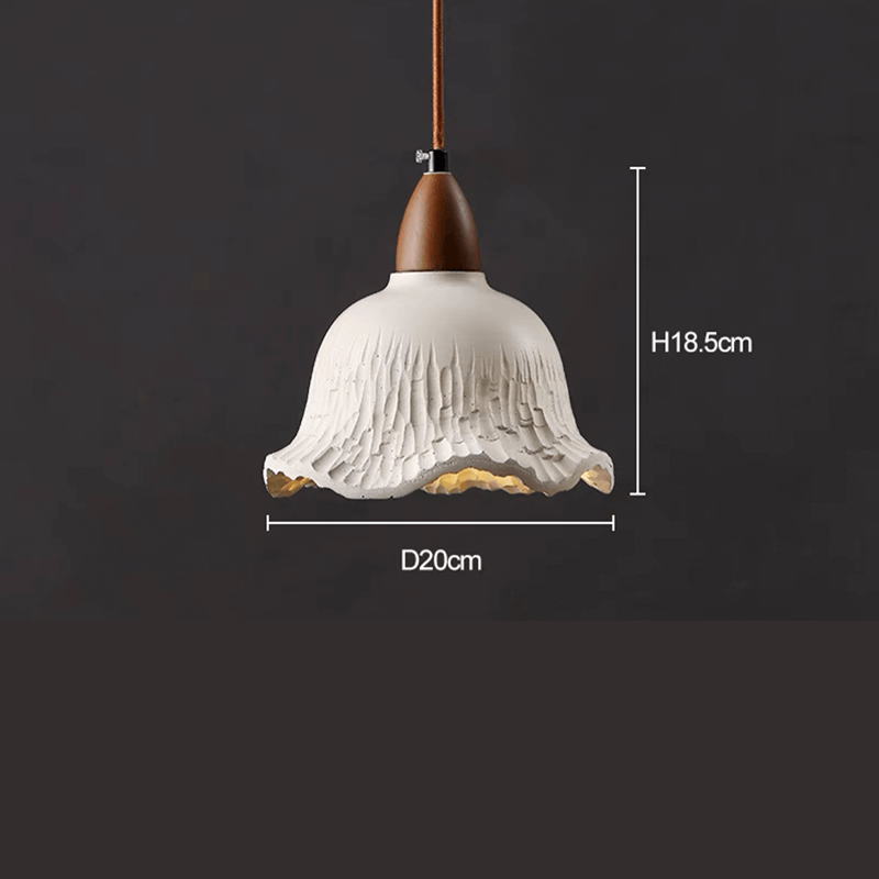 Vintage concrete hanging lamp showcasing its elegant flower shade design from a side angle.