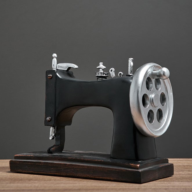 Vintage sewing machine decor placed in a beautifully styled sewing room.