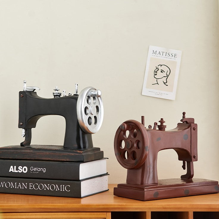 Side view of charming vintage resin sewing machine decor showcasing intricate details.
