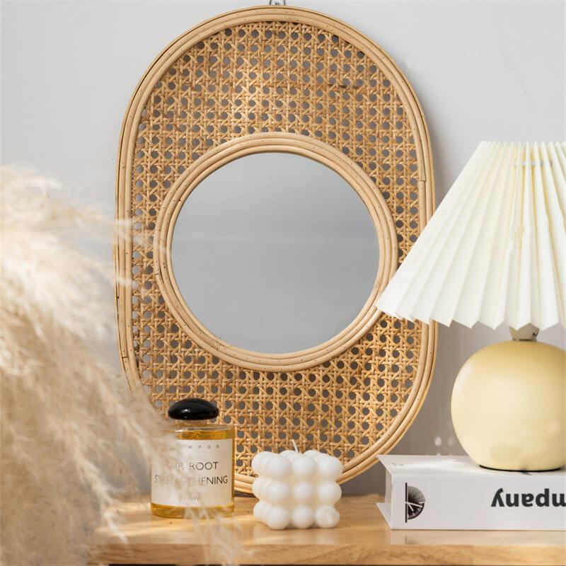 Front view of the Elegant Rattan Oval Vanity Mirror, showcasing the intricate rattan weave and oval shape.