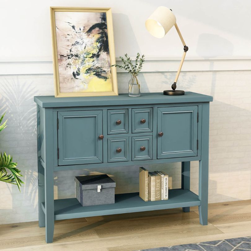Side view of the vintage solid wood entryway table, highlighting the dark blue finish and bottom shelf.