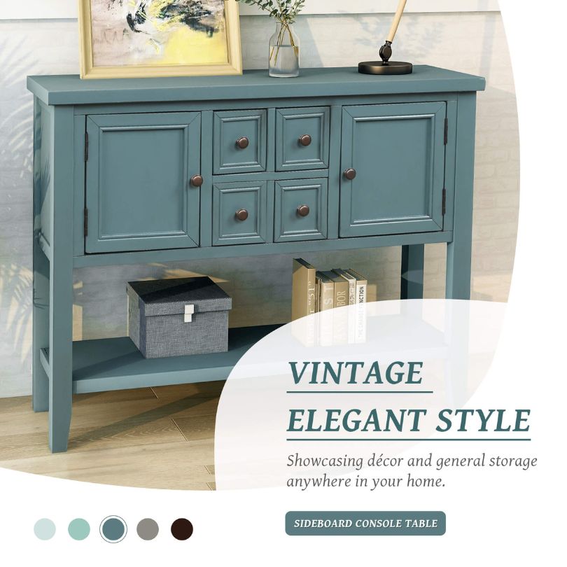 Close-up of the vintage buffet tables drawers and cabinets, emphasizing its solid wood construction.