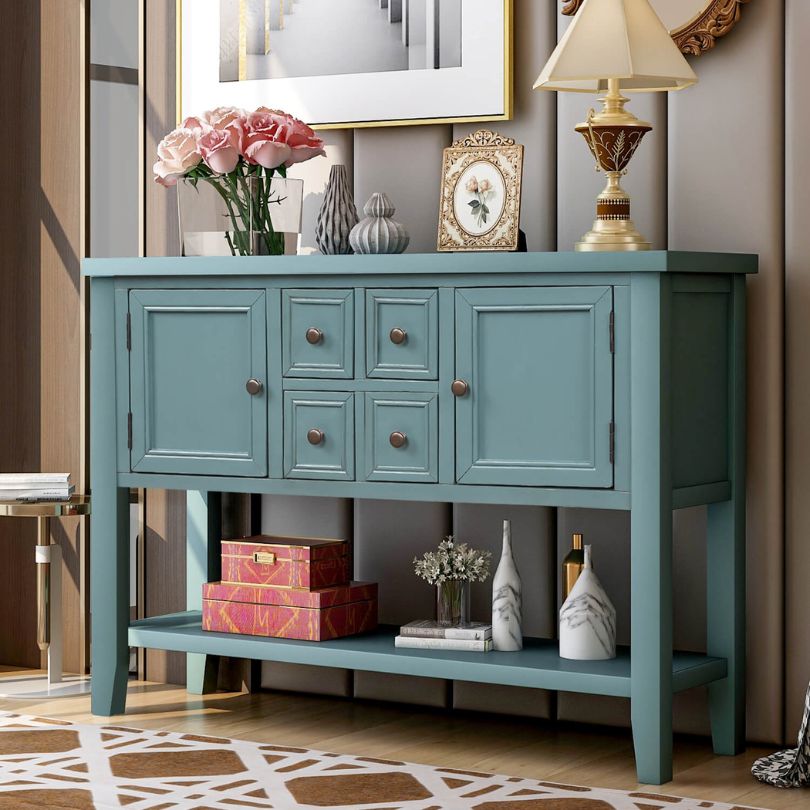 Close-up of the vintage buffet tables drawers and cabinets, emphasizing its solid wood construction.