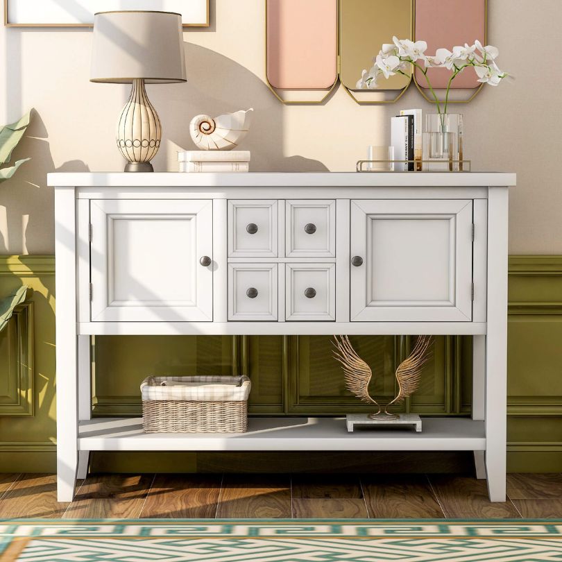 Front view of the vintage solid wood buffet table showcasing its drawers and bottom shelf.