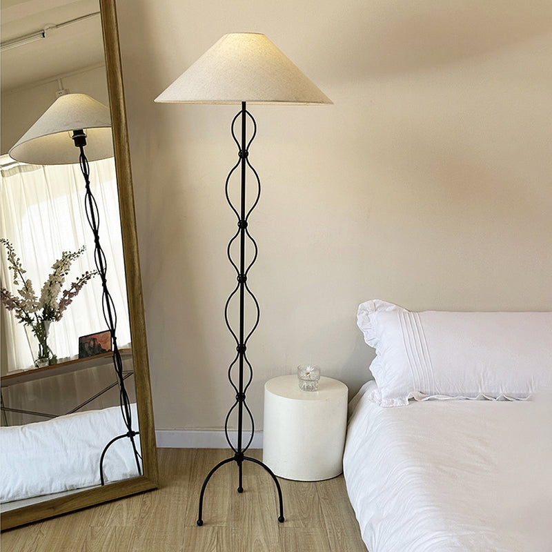 Vintage Elegance LED Corner Floor Lamp showcasing its fabric shade and elegant design in a cozy living room.