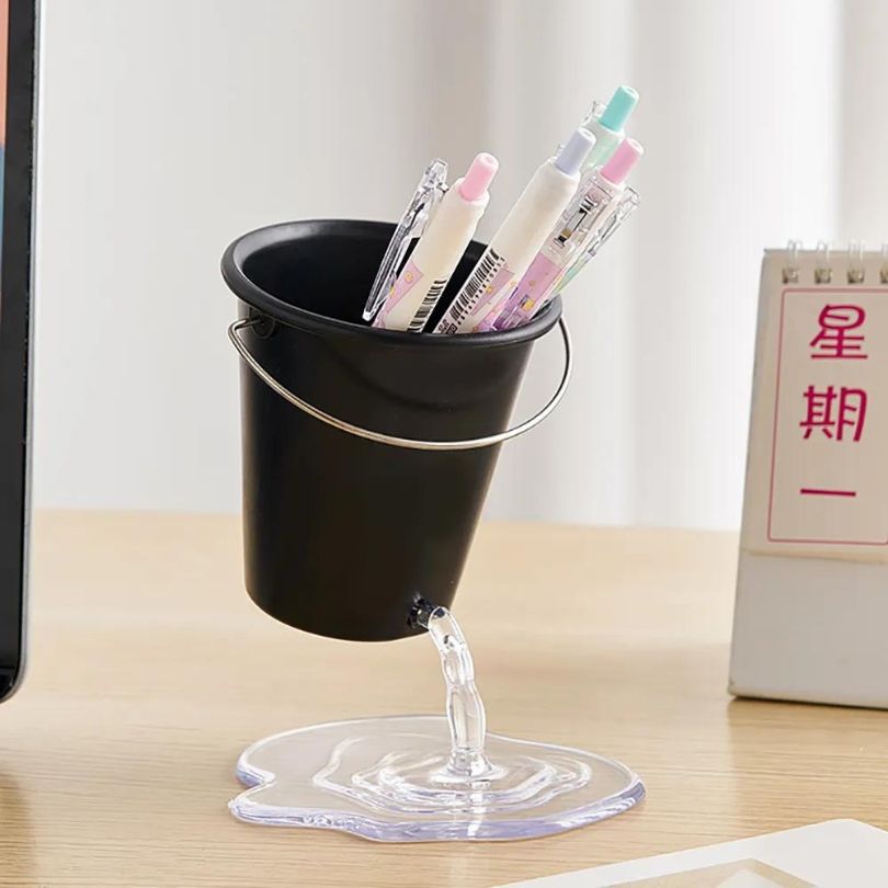 Chic Water Bucket Pen Holder displayed on a stylish desk, showcasing its modern design.