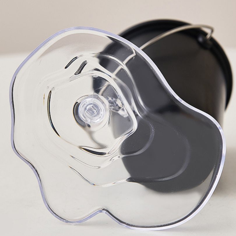 Stylish pen holder on a countertop, adding a decorative touch to an office space.