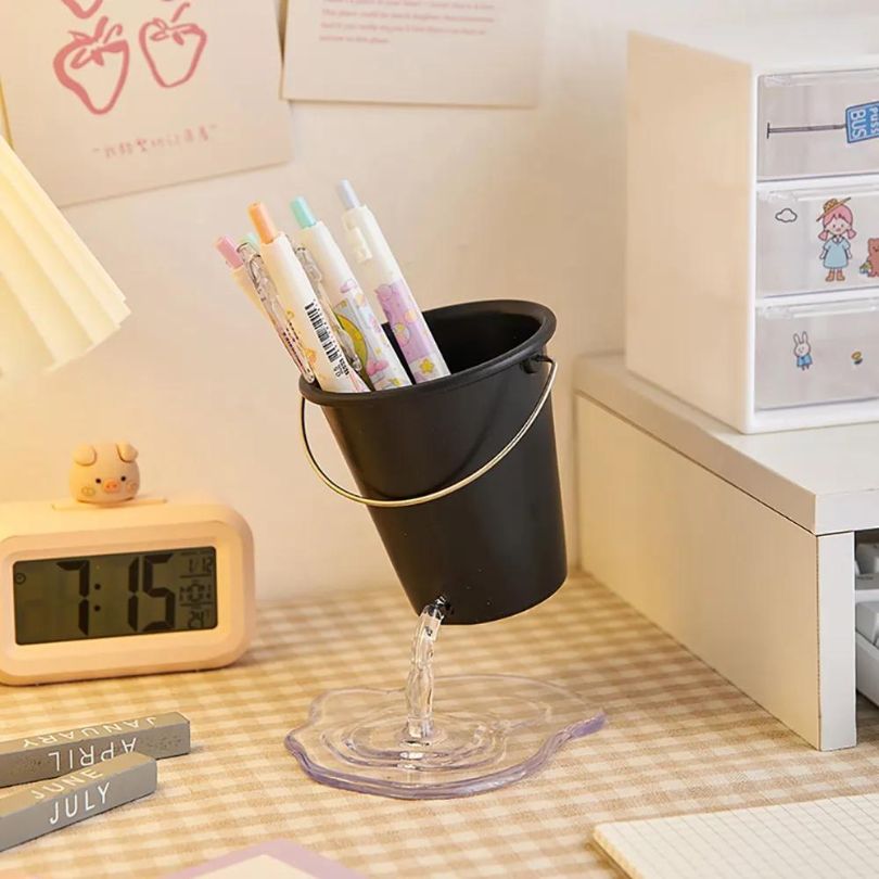 Black Water Bucket Design Pen Holder filled with colorful writing instruments, ideal for home office use.
