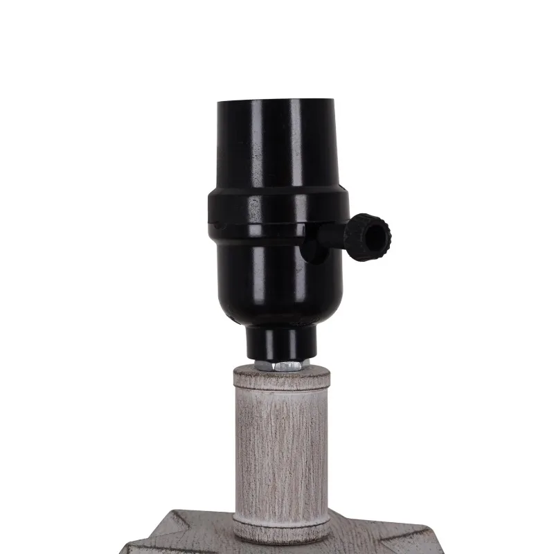 Elegant White Wash Faux Wood Table Lamp on a bedside table with warm lighting.