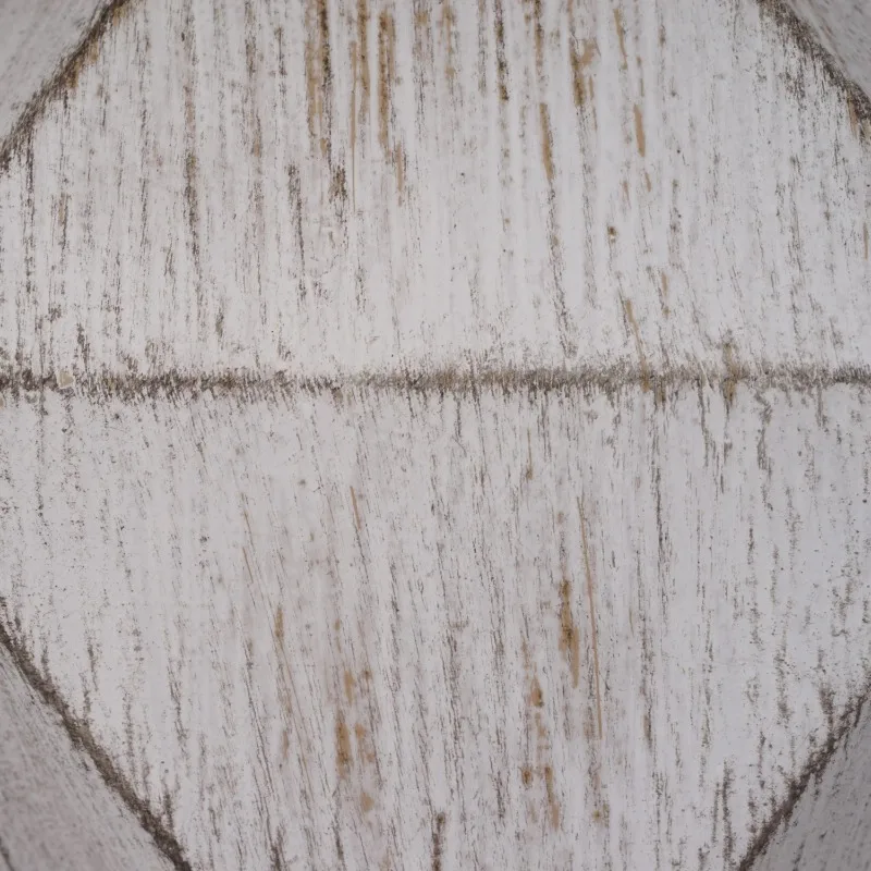 Close-up of the faceted faux wood texture of the modern lamp.