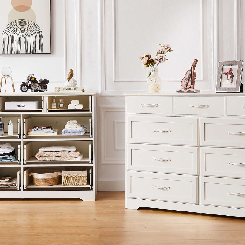 Side view of dresser styled in a classic bedroom with neutral décor