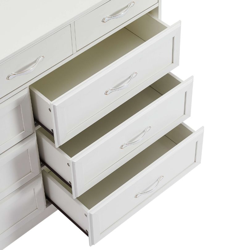 Front angle of white dresser showcasing 9 spacious drawers and antique handles