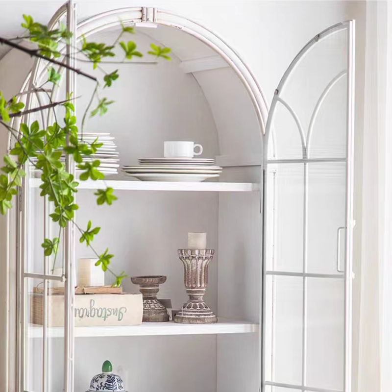 Detailed shot of tempered glass doors and wooden shelving on retro bookcase