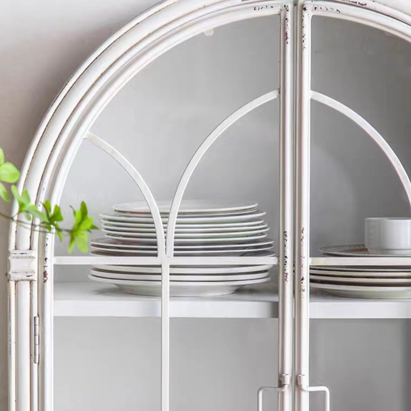 Detailed shot of tempered glass doors and wooden shelving on retro bookcase